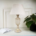 Clisha Distressed Beige Wooden Table Lamp